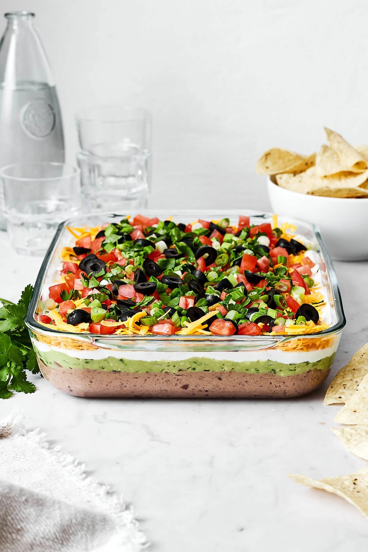 A baking dish with 7 layer dip