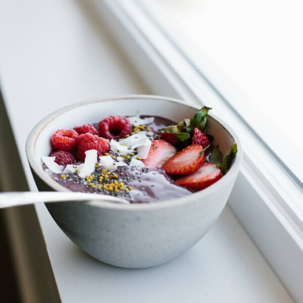 Acai bowl with mixed berries. A delicious, healthy, gluten-free smoothie bowl for breakfast or lunch.