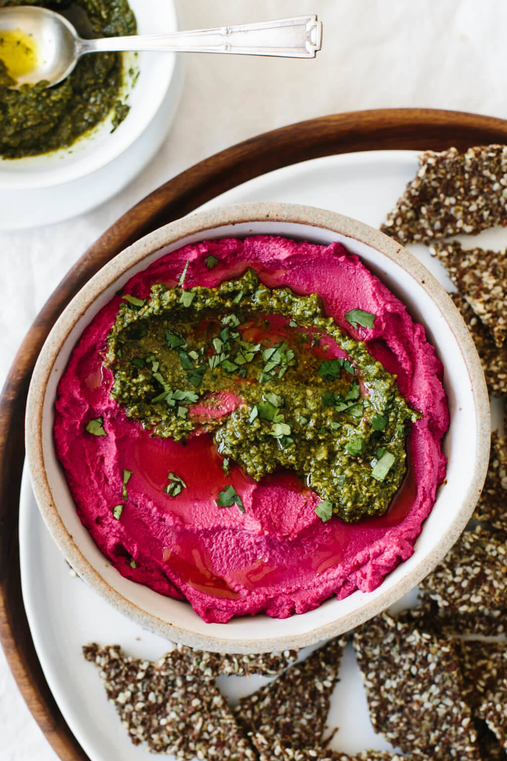 Beet hummus is made with oven roasted beets, chickpeas, tahini, olive oil, lemon juice and garlic. It's a vibrant and healthy snack or appetizer recipe.