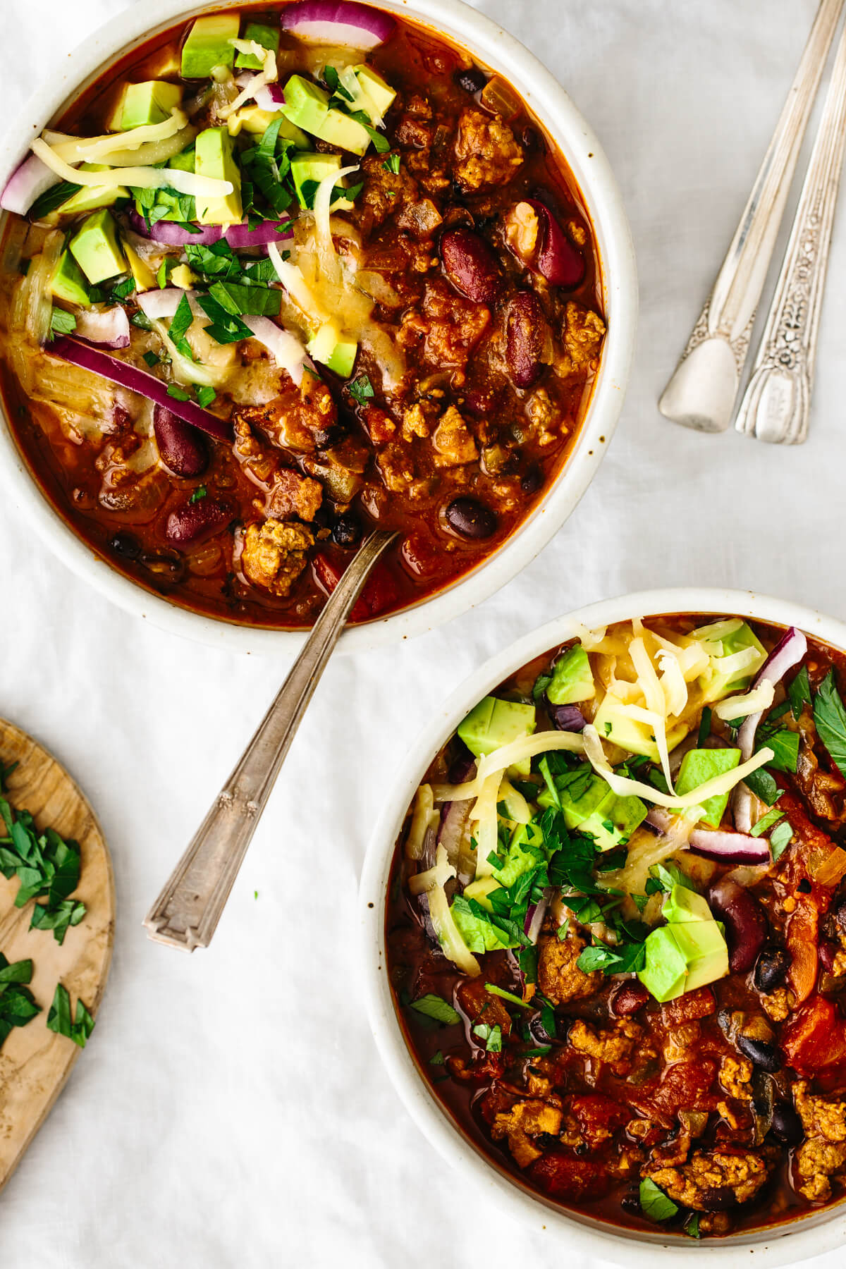 Two bowls of beef chili.