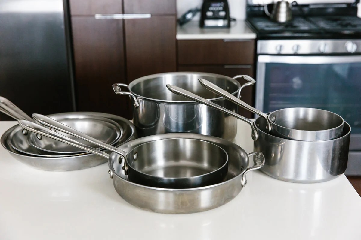 Set of stainless steel cookware.
