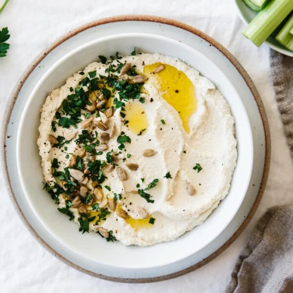 Roasted cauliflower hummus is a delicious chickpea-free version of hummus that's low-carb, keto, paleo and Whole30 friendly.