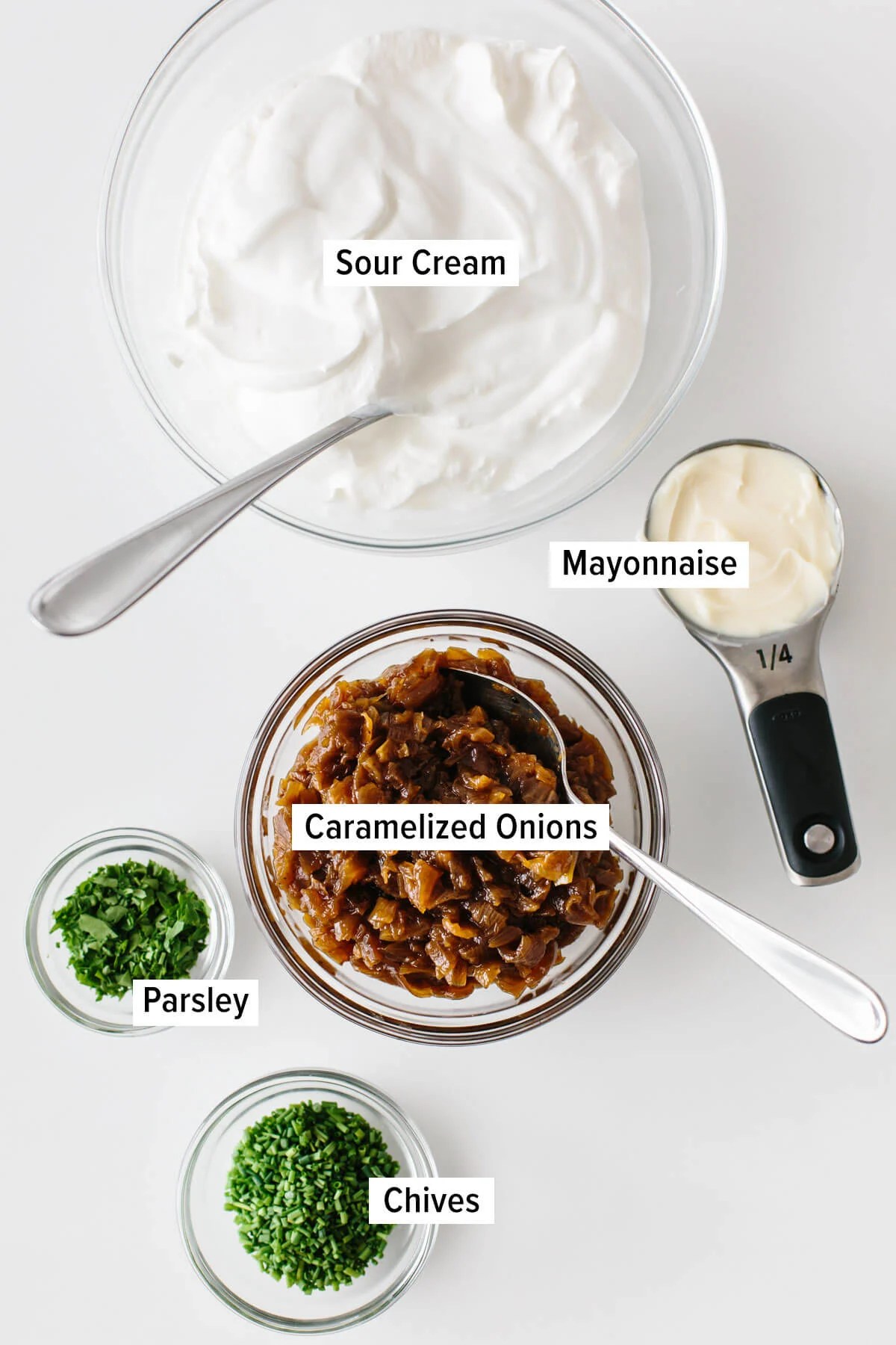 Ingredients for french onion dip on a table