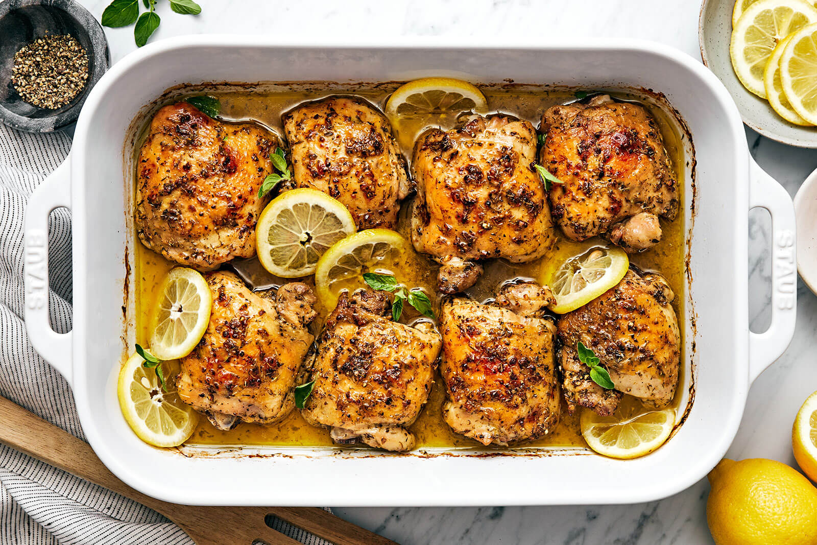 A baking dish with Greek lemon chicken