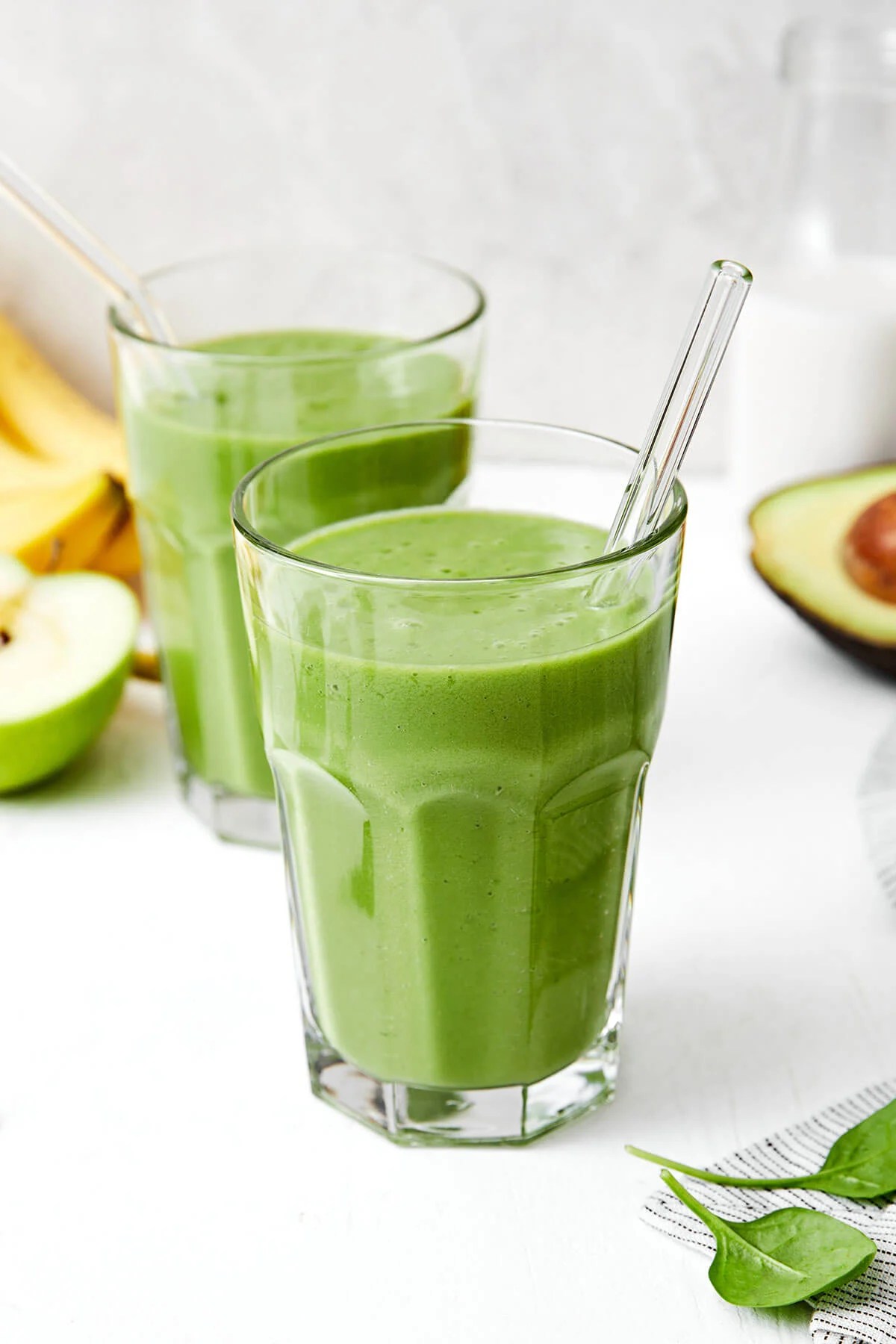 Glasses of green smoothie.