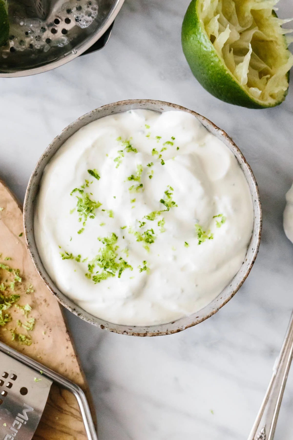 Lime crema in a serving bowl.