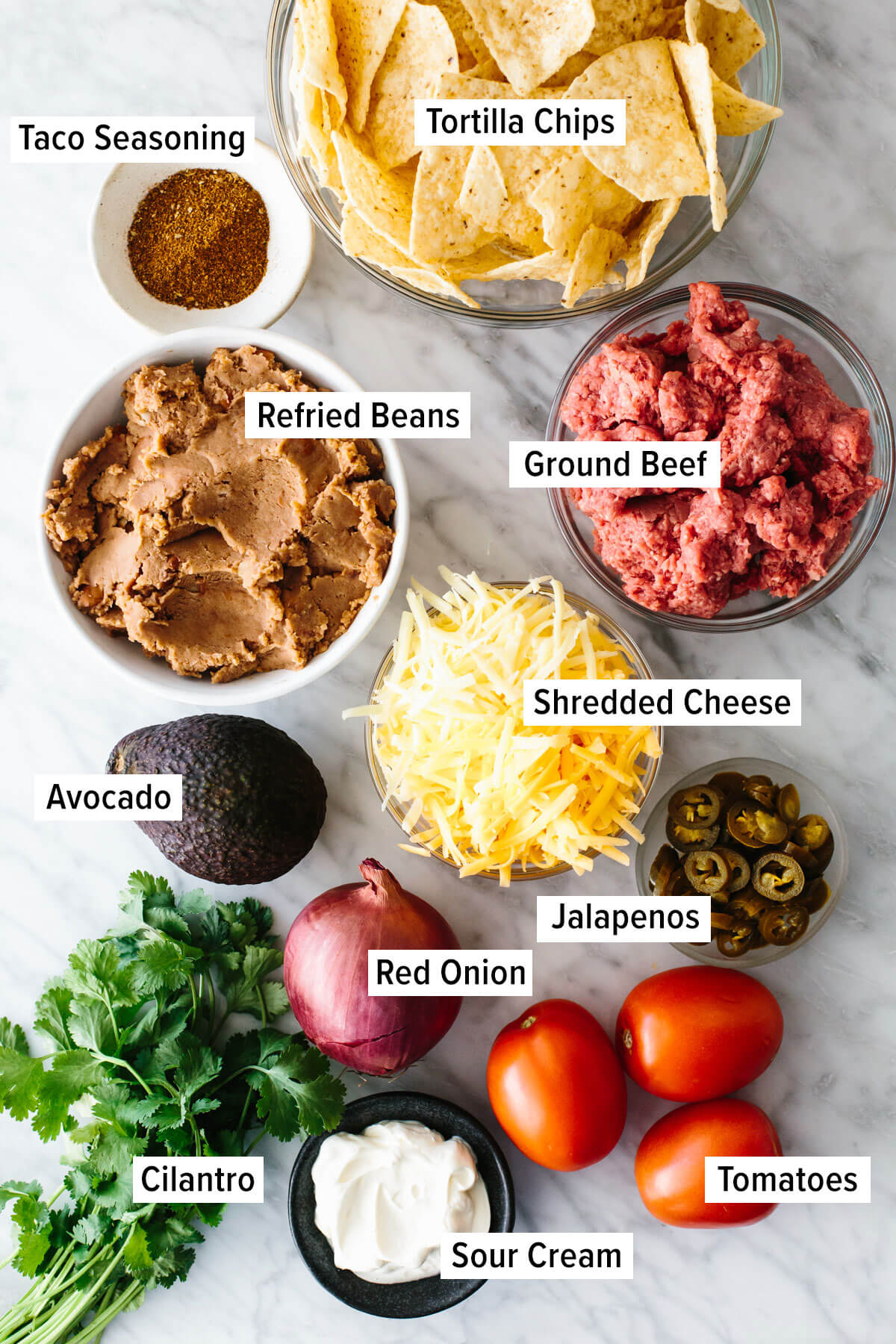 Ingredients for the best nachos on a table