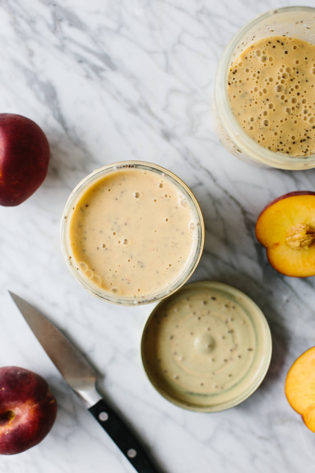 A delicious peach smoothie that makes for a healthy, breakfast smoothie when blended with yogurt and chia seeds. Make this with dairy or dairy-free.