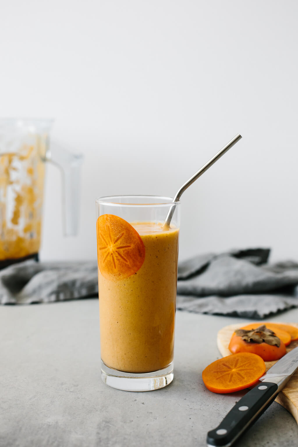 This persimmon smoothie is the perfect smoothie for fall. Made with persimmons, banana, ginger, cinnamon and cloves, it's slightly spiced and deliciously sweet. 
