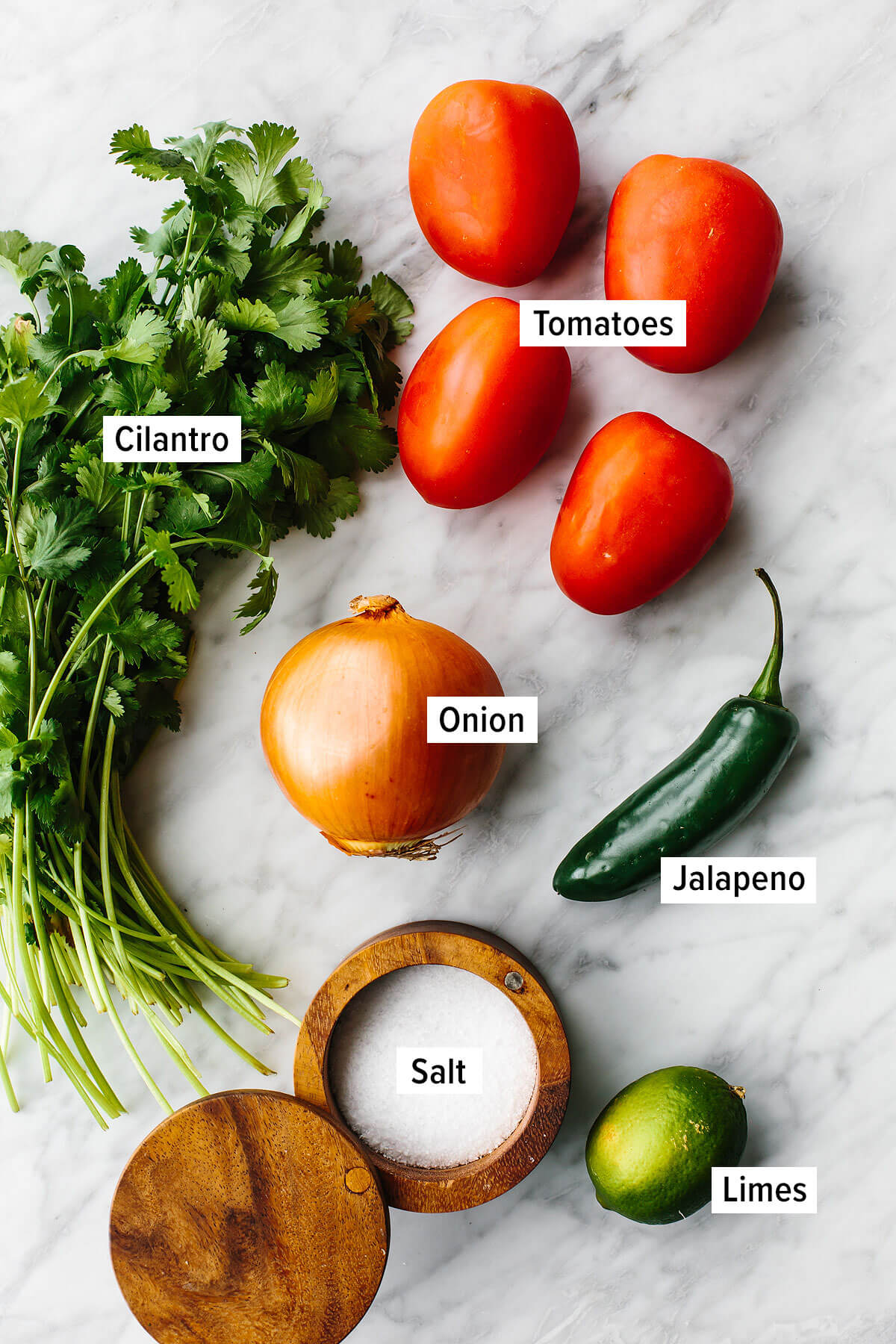 Ingredients for pico de gallo on a table
