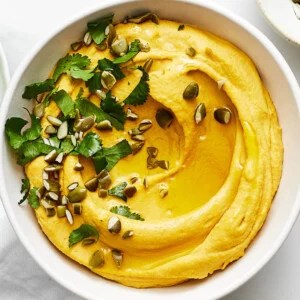 Roasted carrot hummus in a bowl