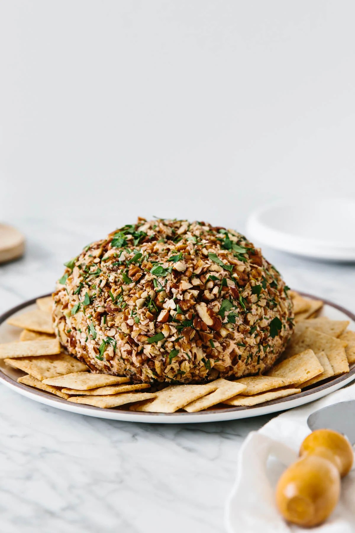Smoked salmon cheese ball rolled in pecans and herbs.